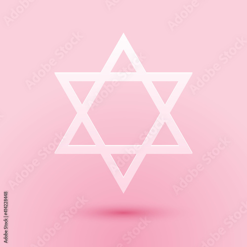 Paper cut Star of David icon isolated on pink background. Jewish religion symbol. Paper art style. Vector.