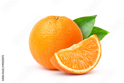 Orange fruit with segment and green leaves isolated on white background.
