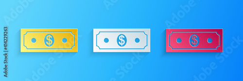 Paper cut Paper money american dollars cash icon isolated on blue background. Dollar banknote sign. Paper art style. Vector.
