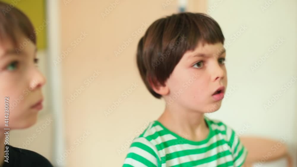Emotional facial expression. The focus of attention is the monitor. Concentration of attention. Faces of teenagers during a video game. Accommodation of inner feelings. Emotional facial expression. The focus of attention is the monitor. Concentration of attention. Faces of teenagers during a video game. Accommodation of inner feelings.