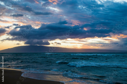 Fototapeta Naklejka Na Ścianę i Meble -  Pastel Sunset With Cloudy Sky over Stormy Windblown Sea