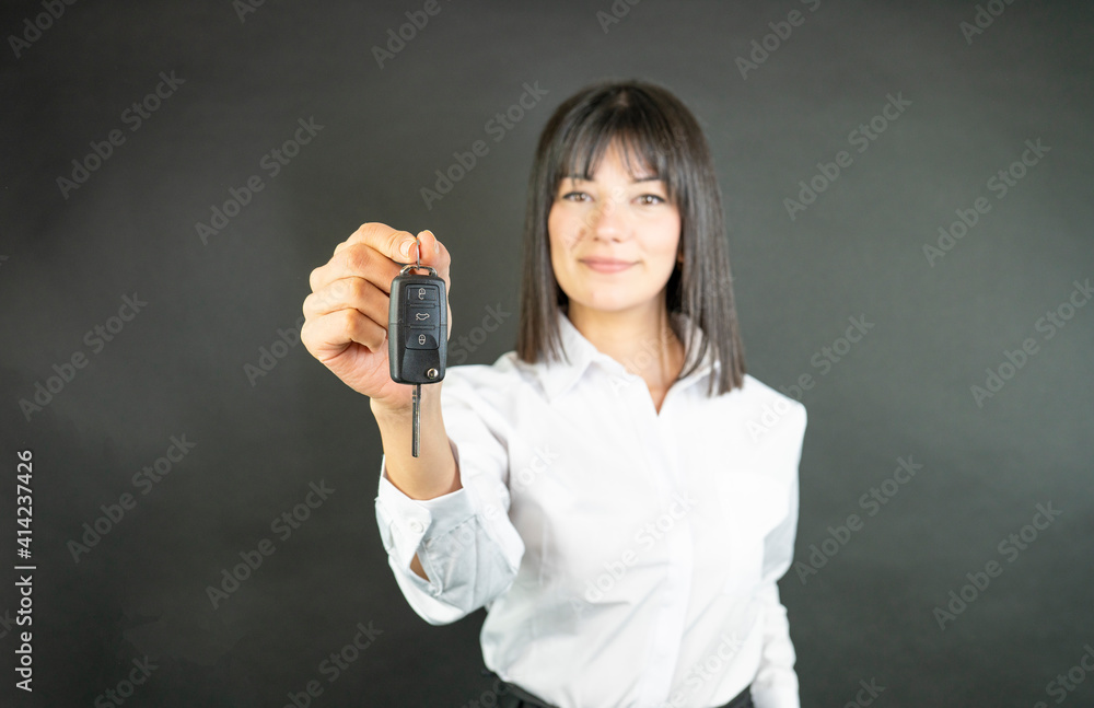 Hand with a car key. business woman with car key Hand with a car key. business woman with car key