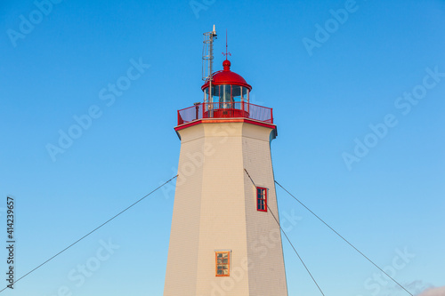 Canada, New Brunswick, Miscou Island. Miscou Lighthouse at sunset.