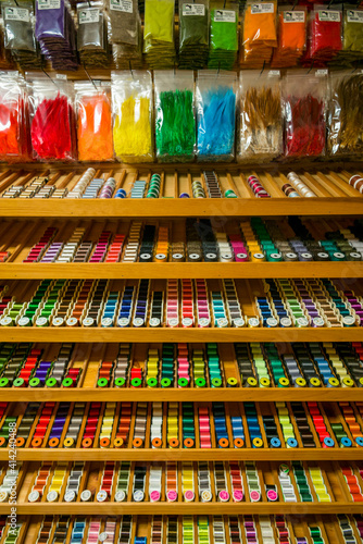 Canada, New Brunswick, Miramichi River Valley, Doaktown. Colorful thread and fabrics used in making fishing flies.