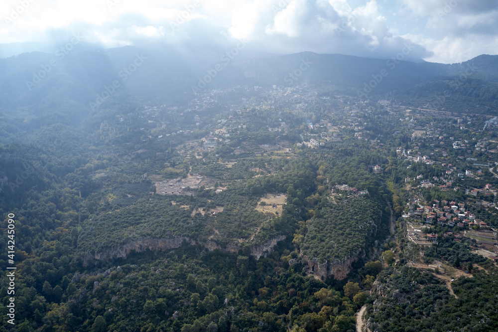 Aerial view of the mountain valley with village. Beautiful nature landscape. View from above.