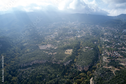 Aerial view of the mountain valley with village. Beautiful nature landscape. View from above.