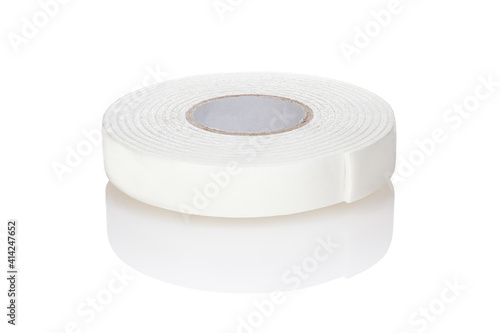 Double sided adhesive foam tape isolated on white background. Close-up. Full depth of field. photo