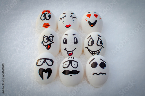 Eggs with funny painted faces.