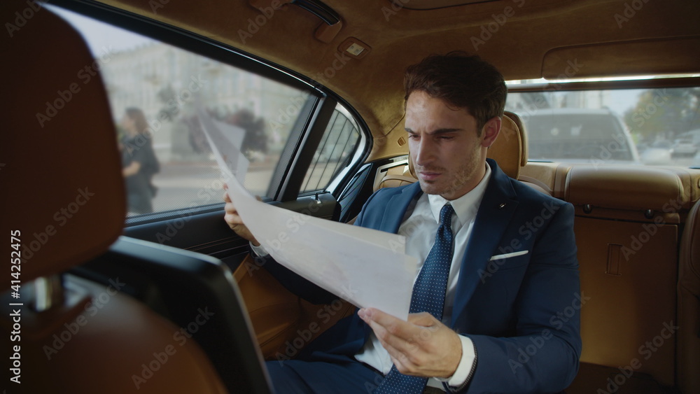 Angry business man frustrating with poor results in modern car. Stressed guy Angry business man frustrating with poor results in modern car. Stressed guy