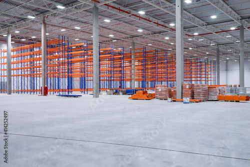 steel shelves rack in new modern large warehouse photo