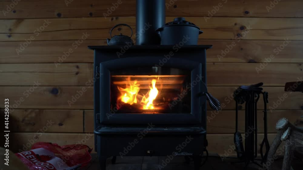 wood burning stove in a winter cabin wood burning stove in a winter cabin