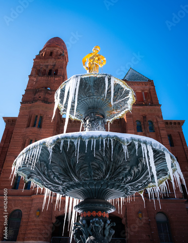 Snow Day at the Bexar County Courthouse in San Antonio Texas. Frozen fountain with icicles at the courthouse