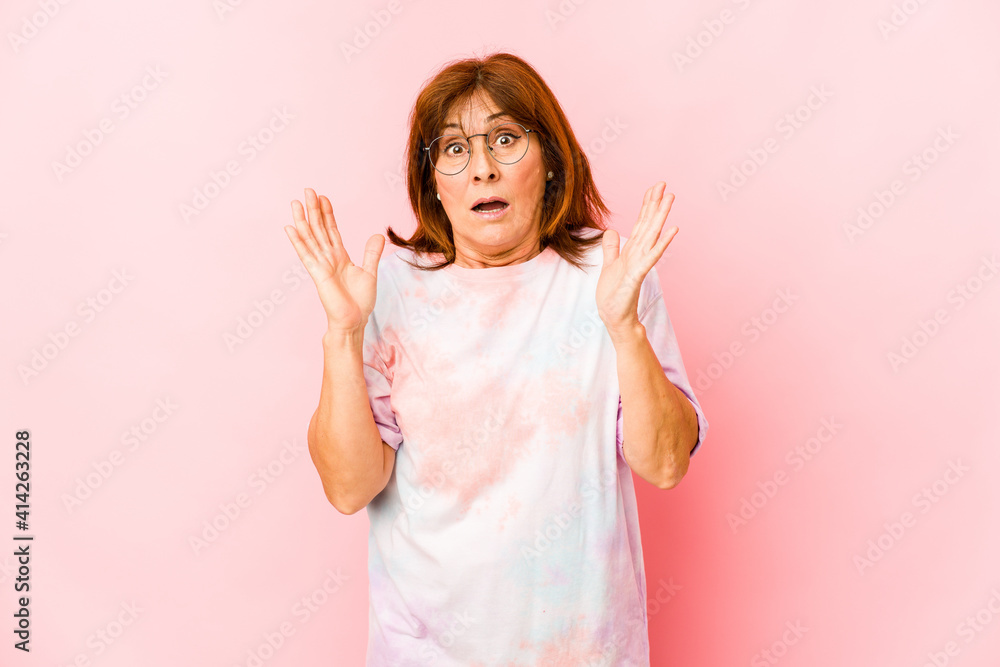 Senior caucasian woman isolated surprised and shocked. Senior caucasian woman isolated surprised and shocked.