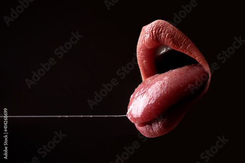 Closeup erotic mouth. Woman sexy tongue. Desire, sensual seductive. photo