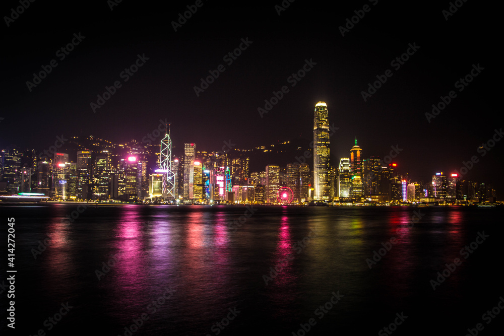 photo of far away buildings hong kong by night