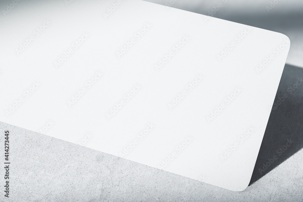 Blank white paper texture of gift card at abstract concrete background. Modern decoration concept. Mockup. 3D rendering. Blank white paper texture of gift card at abstract concrete background. Modern decoration concept. Mockup. 3D rendering.