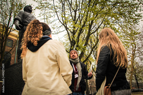 Tour guide in amsterdam with young people