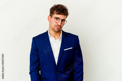 Young business caucasian man isolated on white background sad, serious face, feeling miserable and displeased.