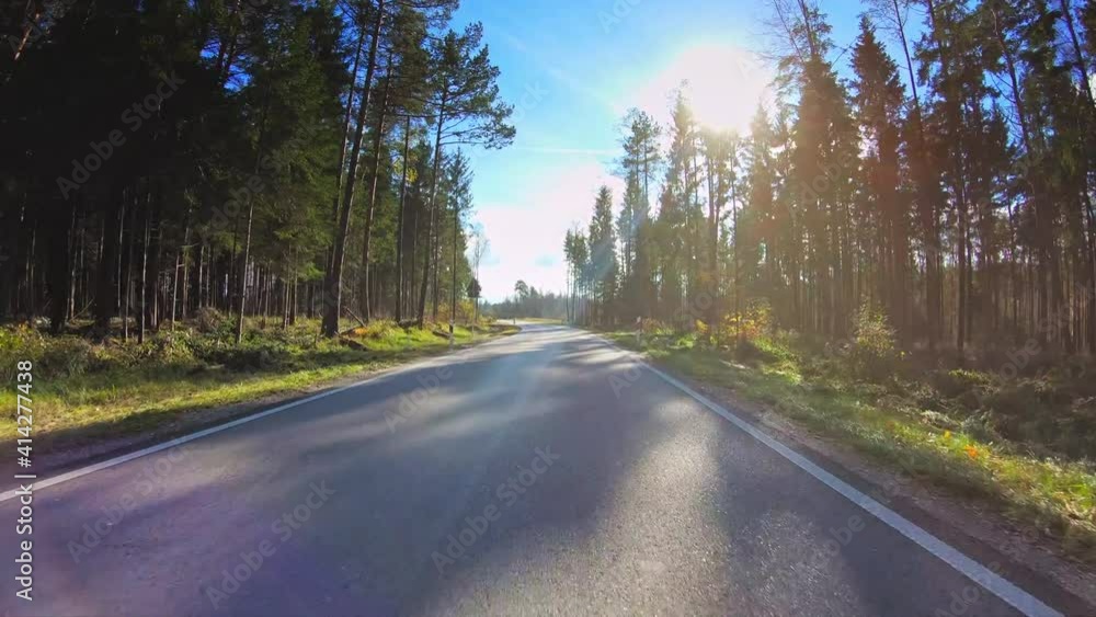 POV drive across beautiful countryside, autumn forest trees, asphalt road, car travel gopro point of view POV drive across beautiful countryside, autumn forest trees, asphalt road, car travel gopro point of view