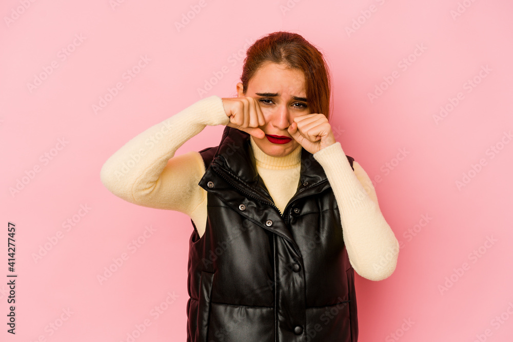 Young arab mixed race woman whining and crying disconsolately. Young arab mixed race woman whining and crying disconsolately.