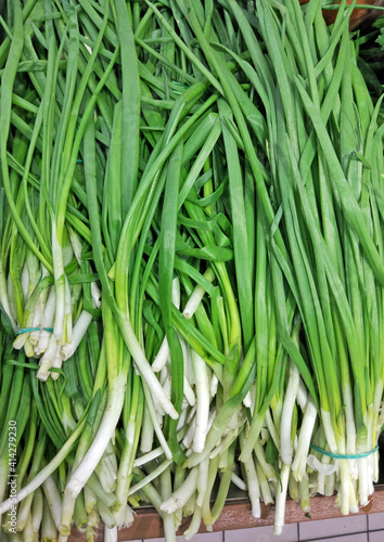 bunches of onions in a supermarket