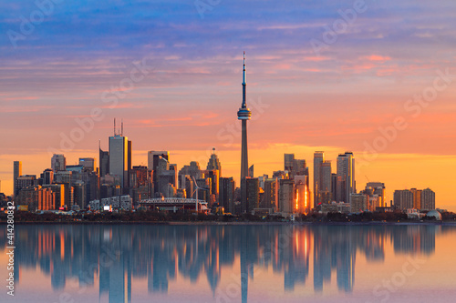 SUNRISE IN TORONTO CANADA REFLEXING IN THE WATER photo