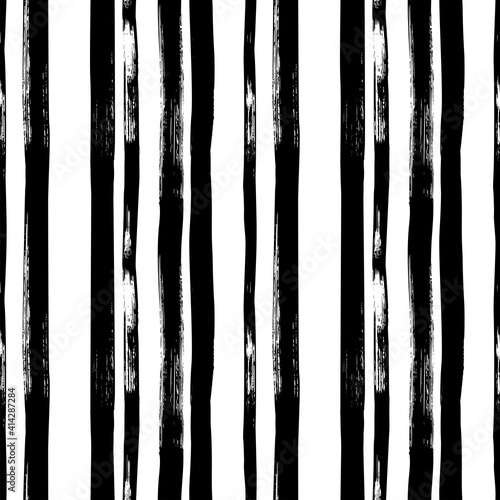 Hand drawn bold vertical lines vector seamless pattern. Grunge black vertical stripes. Abstract vector geometric black and white simple pattern. Print for interior design, wrapping paper, fabric.