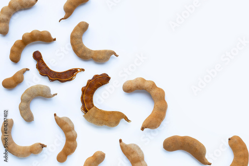 Tamarind tropical fruit on white background. Top view