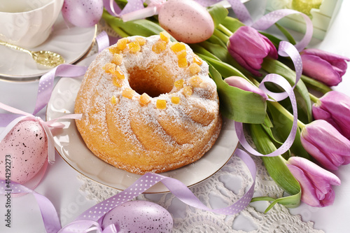 Easter ring cake with tulip and egg decoration photo