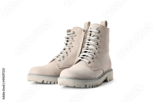 Pair of stylish boots on white background photo