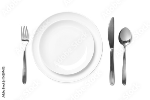 Beautiful table setting on white background, top view