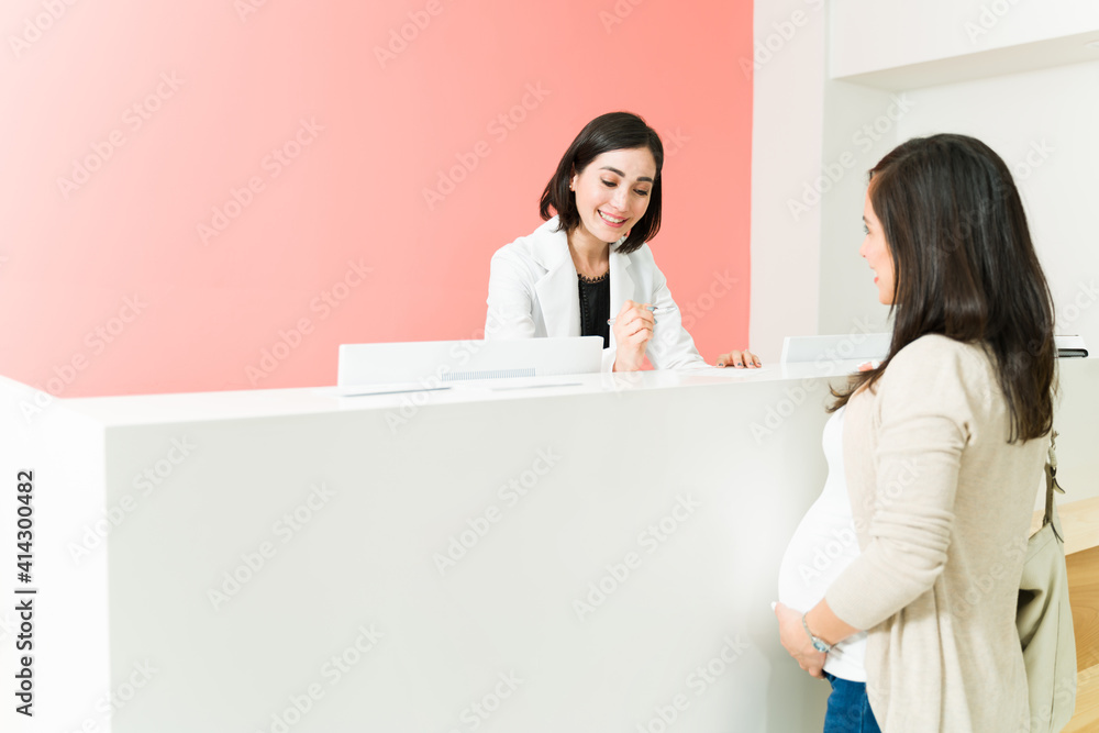 Pregnant woman arriving at her doctor's appointment Pregnant woman arriving at her doctor's appointment