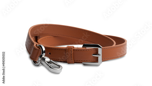 a soft brown leather belt or bag strap isolated on white background