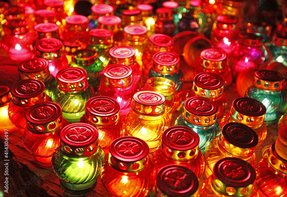 a lot of shiny colorful candles. blurred image