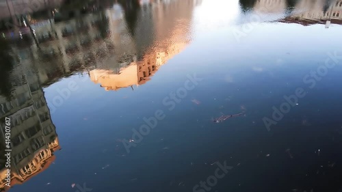 Slow motion reflection of the city on the canal. Eskisehir, Turkey.