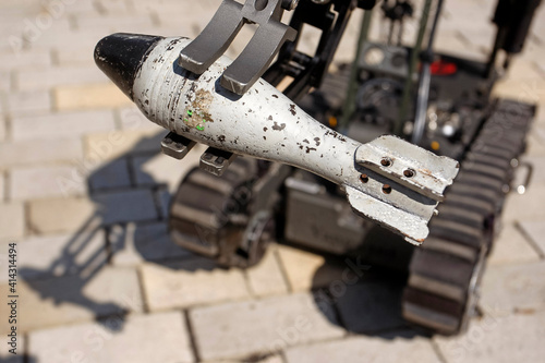 mine with remote-controlled robot, demaning, close up.