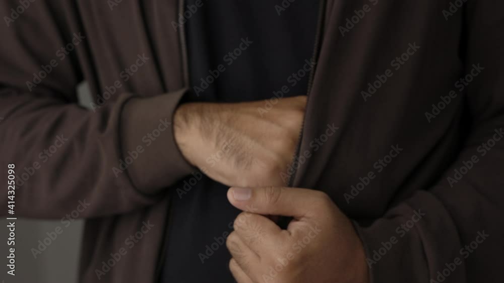 Close up male hand put out the wallet from his coat. Showing the brown wallet. Financial business concept.
Close up male hand put out the wallet from his coat. Showing the brown wallet. Financial business concept.