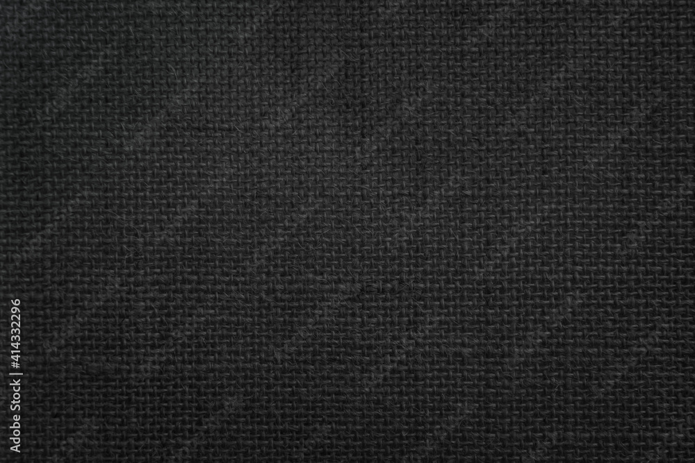 Jute hessian sackcloth canvas woven texture pattern background in light black color blank empty. Jute hessian sackcloth canvas woven texture pattern background in light black color blank empty.