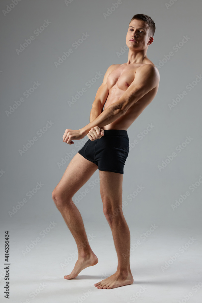 male bodybuilder with pumped body posing workout studio male bodybuilder with pumped body posing workout studio