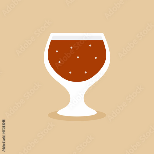 A glass of wine, brandy, co...