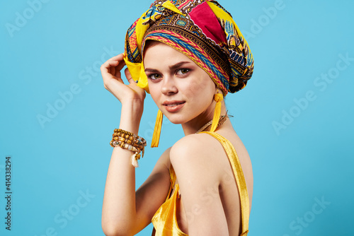 pretty woman decoration multicolored headscarf ethnicity blue background