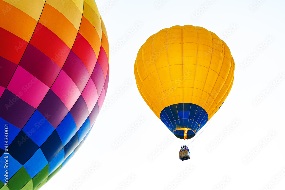 Fototapeta premium Multicolored air balloon in clear blue sky