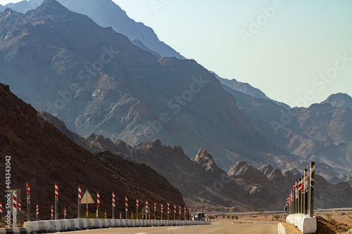 tourist bus travels on the road to Wady Megarah, Sinai, Egypt