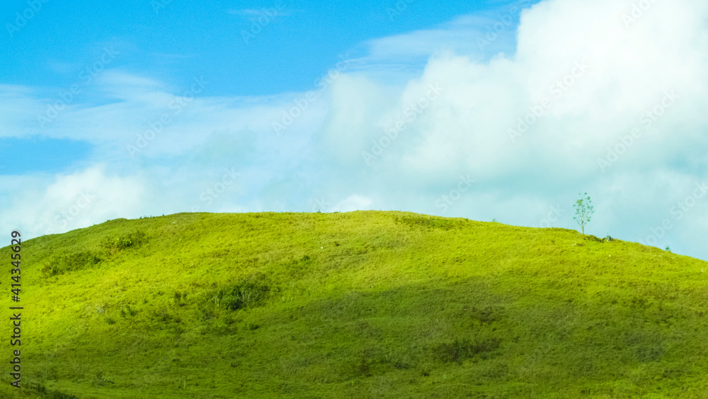 scenery of green karst hill with white cloud ornament on it scenery of green karst hill with white cloud ornament on it