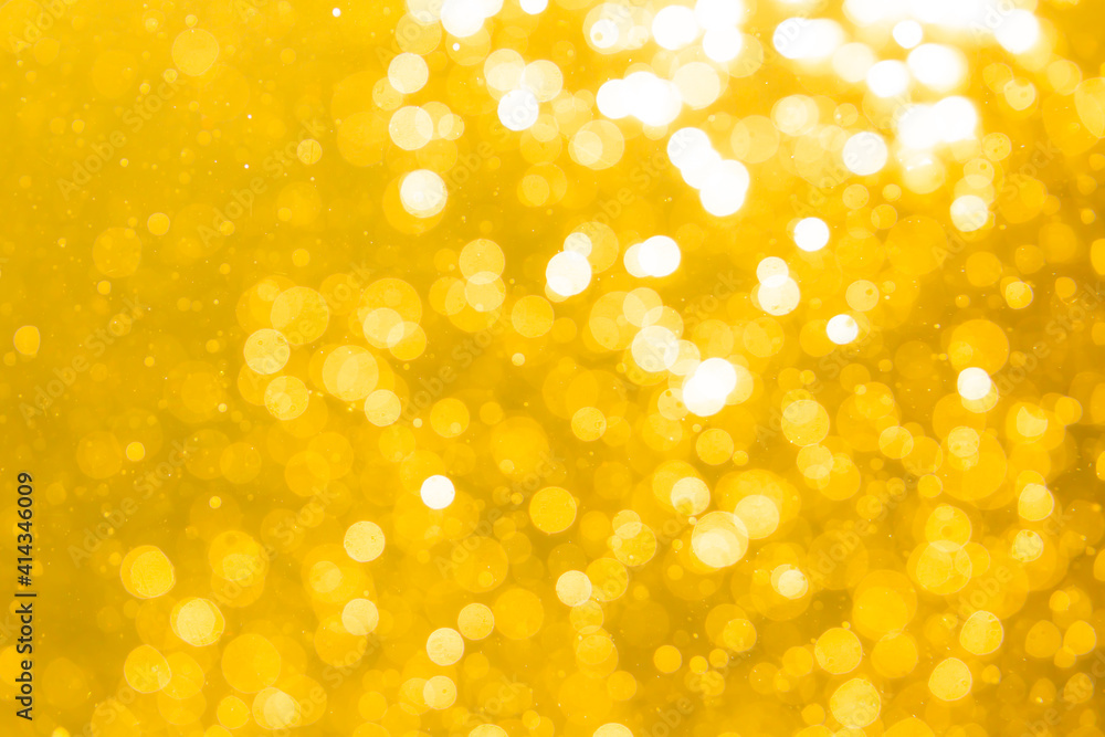 Gold bokeh from light in water Gold bokeh from light in water