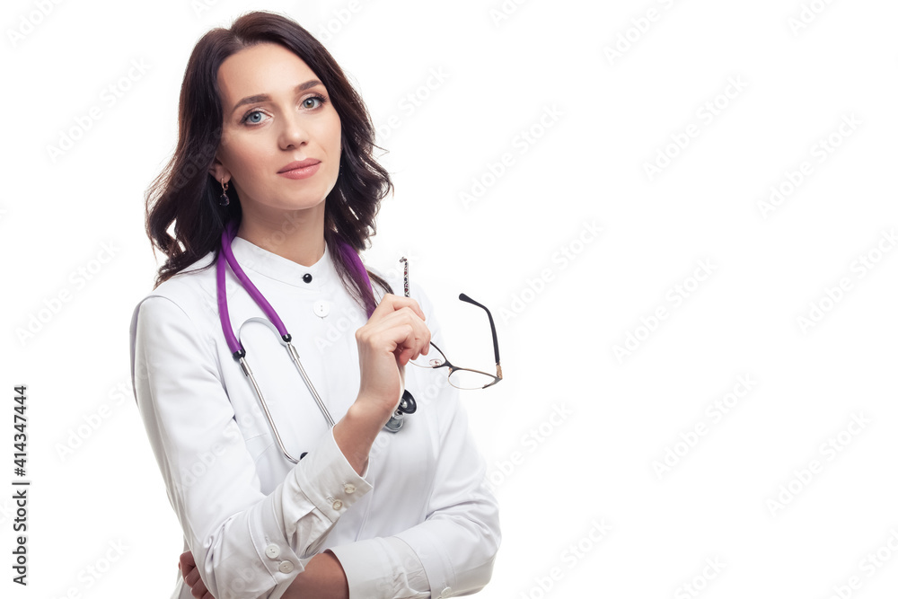 Professional Confident Female GP Doctor Posing in Doctor's Smock With Endoscope and Glasses On White Background. Professional Confident Female GP Doctor Posing in Doctor's Smock With Endoscope and Glasses On White Background.