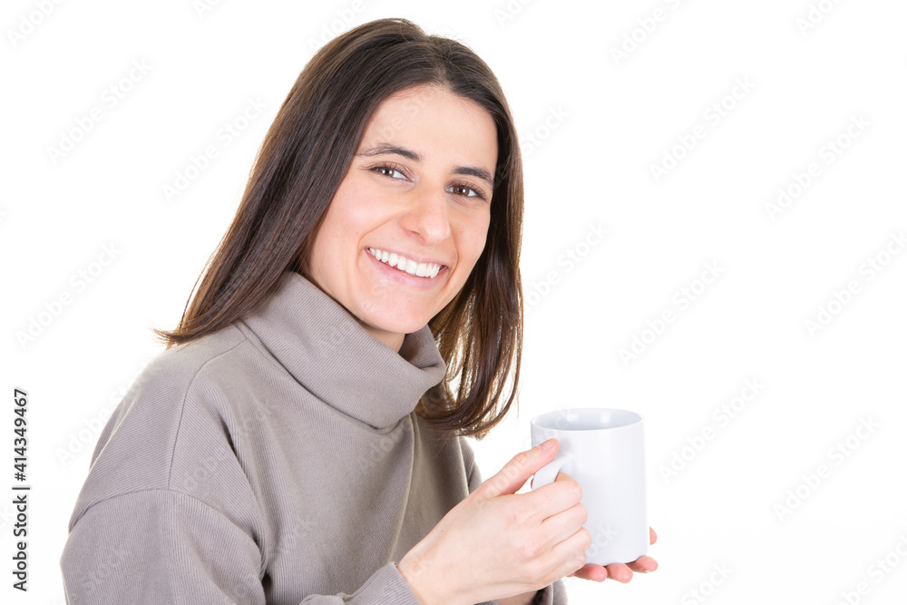 Happy young woman cheerful posing isolated over white background drinking mug coffee hot drink Happy young woman cheerful posing isolated over white background drinking mug coffee hot drink