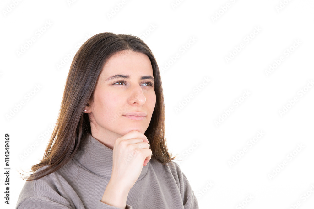 pensive girl creating idea hand finger on chin aside copy space isolated over white background pensive girl creating idea hand finger on chin aside copy space isolated over white background