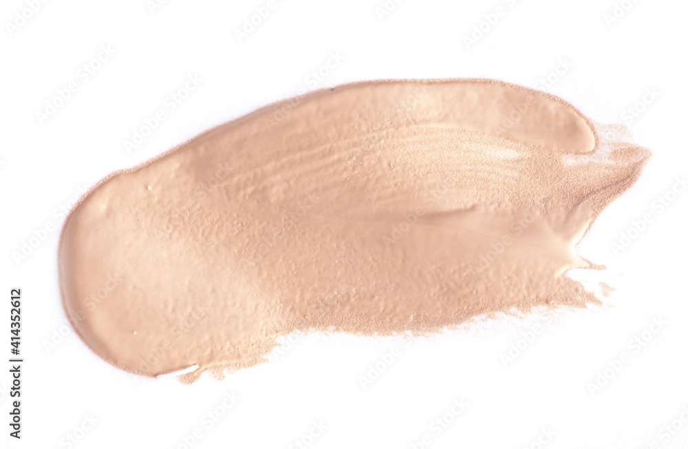 Foundation smear on a white background. A speck of makeup isolated. Foundation smear on a white background. A speck of makeup isolated.