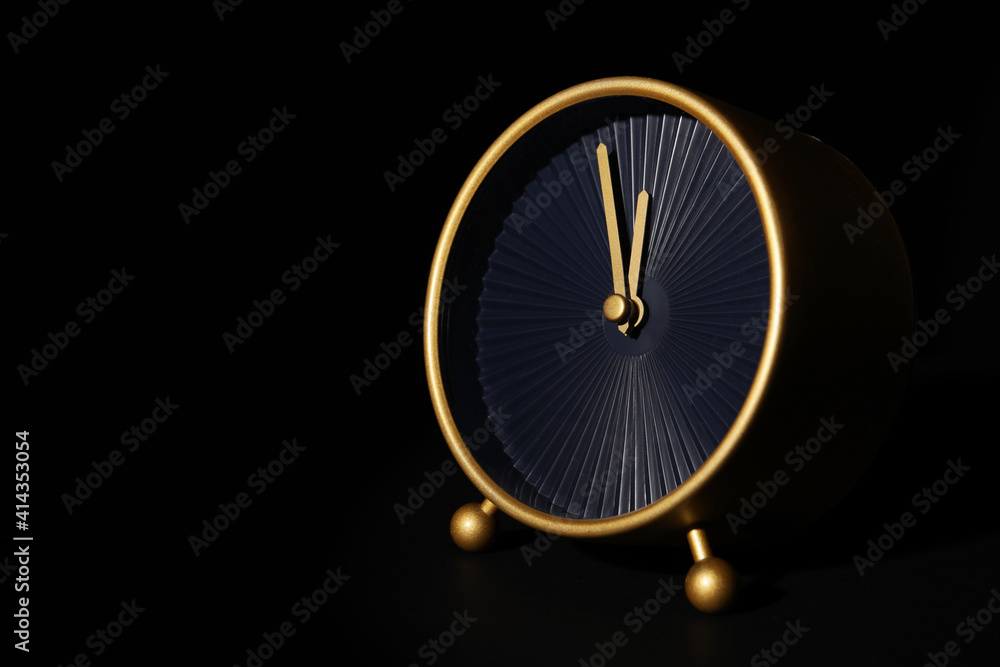Alarm clock on black background Alarm clock on black background